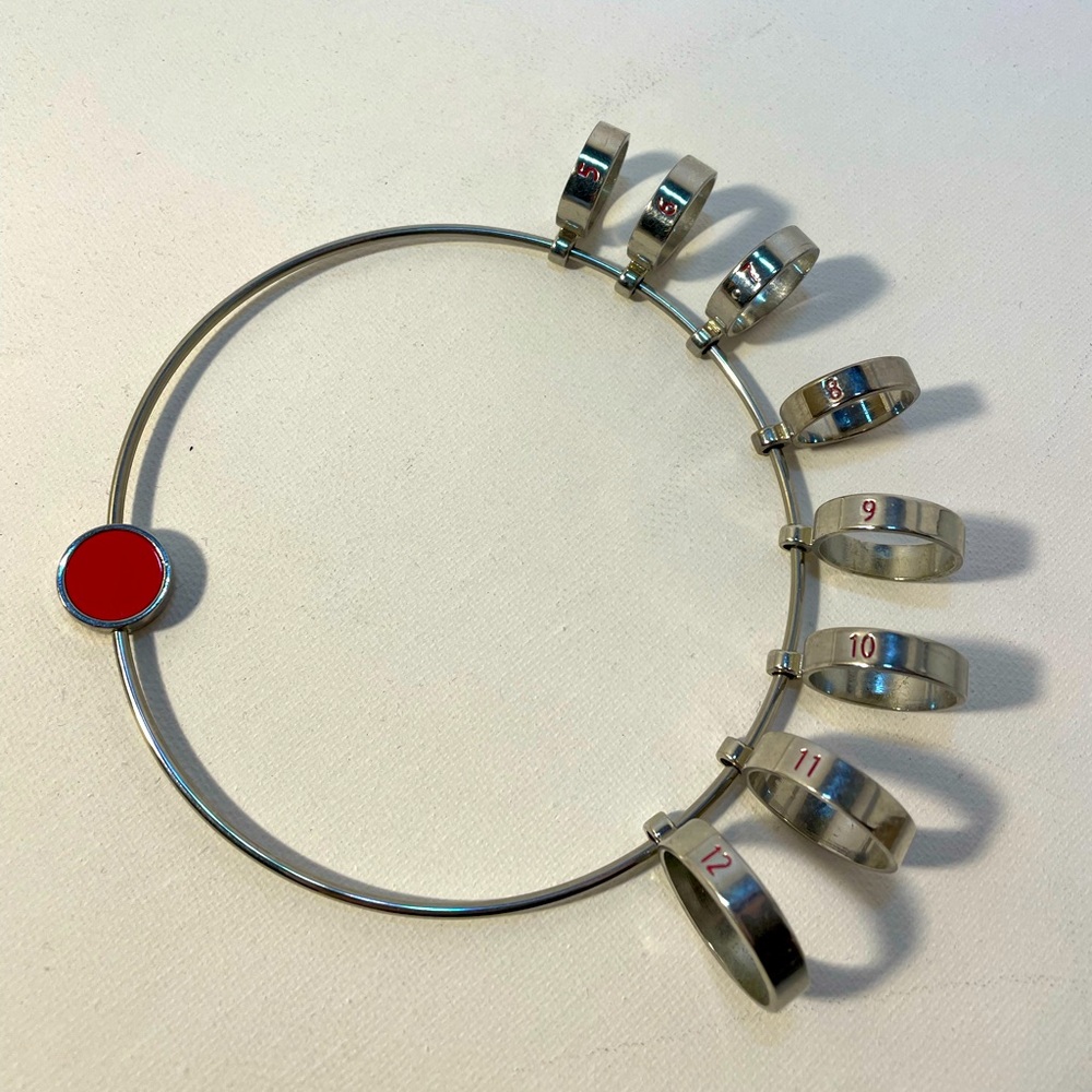 Silver Tone Ring Sizer with Red Accent